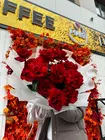 Оформить заказ на Букет из 21 вывернутой розы "Рубиновый бархат" в городе Томск