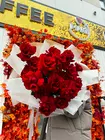 Доставить Букет из 21 вывернутой розы "Рубиновый бархат" по городу Томск