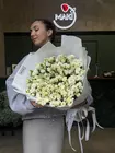 Оформить заказ на Букет из 37 белых эустом в оформлении в Томске